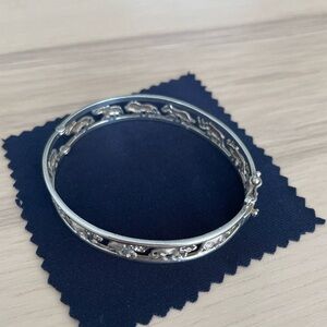 Elegant Silver Big 5 bangle. Sterling silver.
